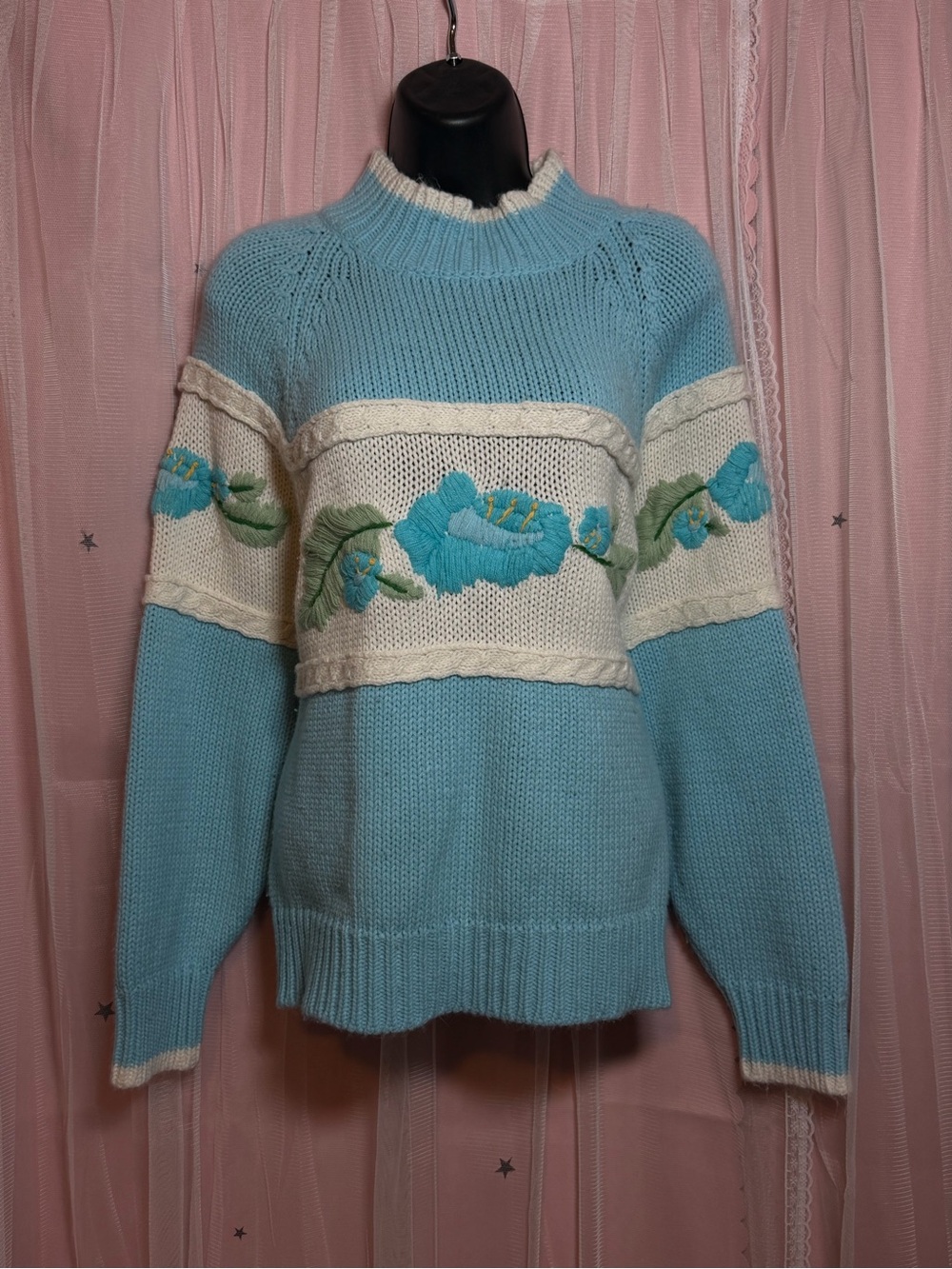 Hand knit blue and white floral turtleneck sweater